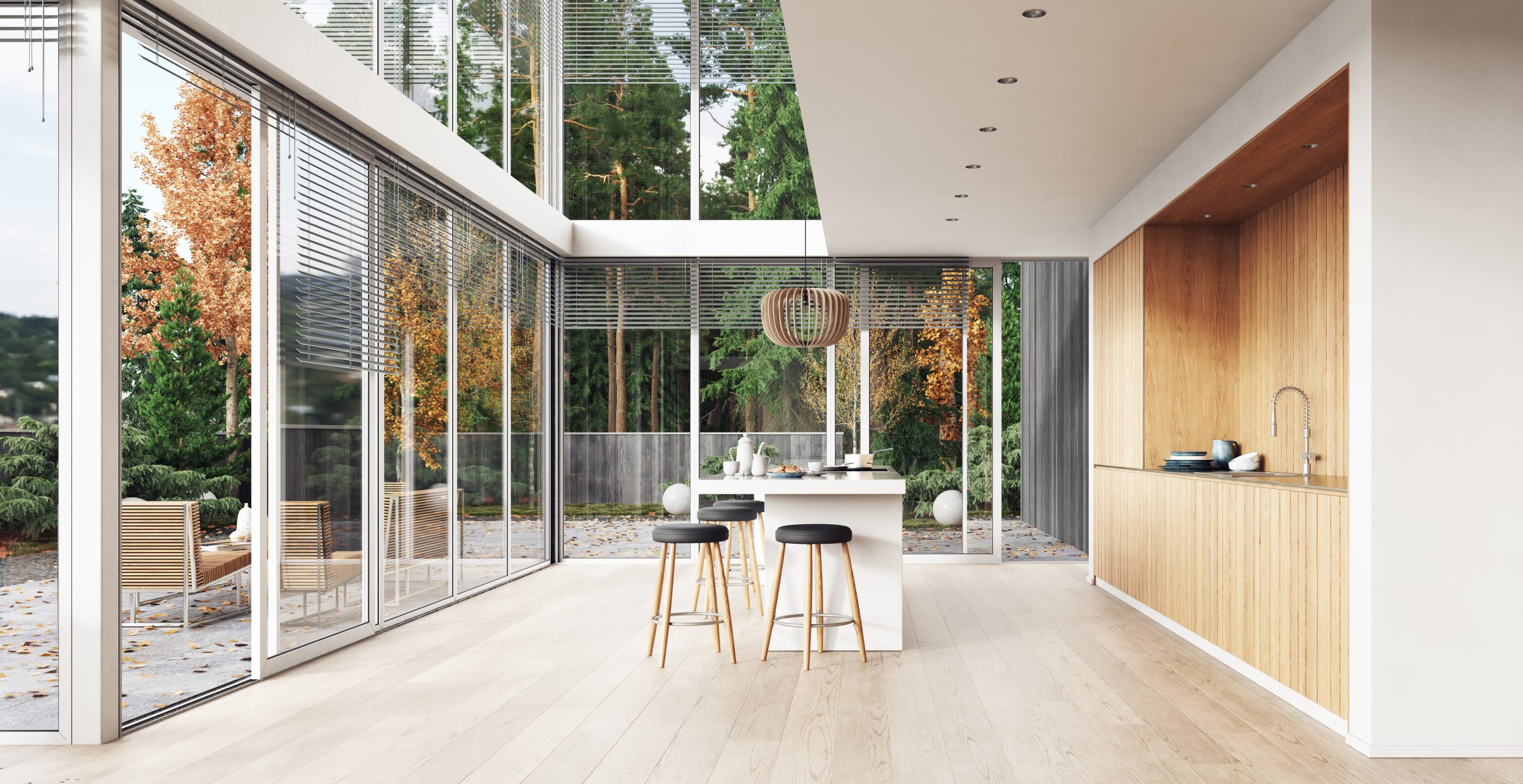 Modern kitchen with large sliding glass doors, bringing in natural light and style